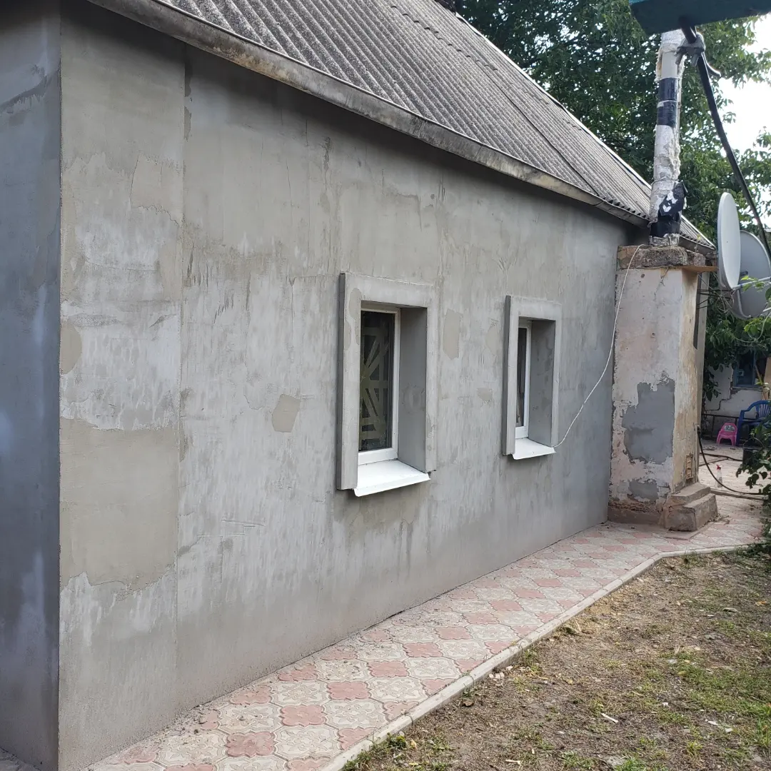 Фото монтаж полістиролу, та штукатурка