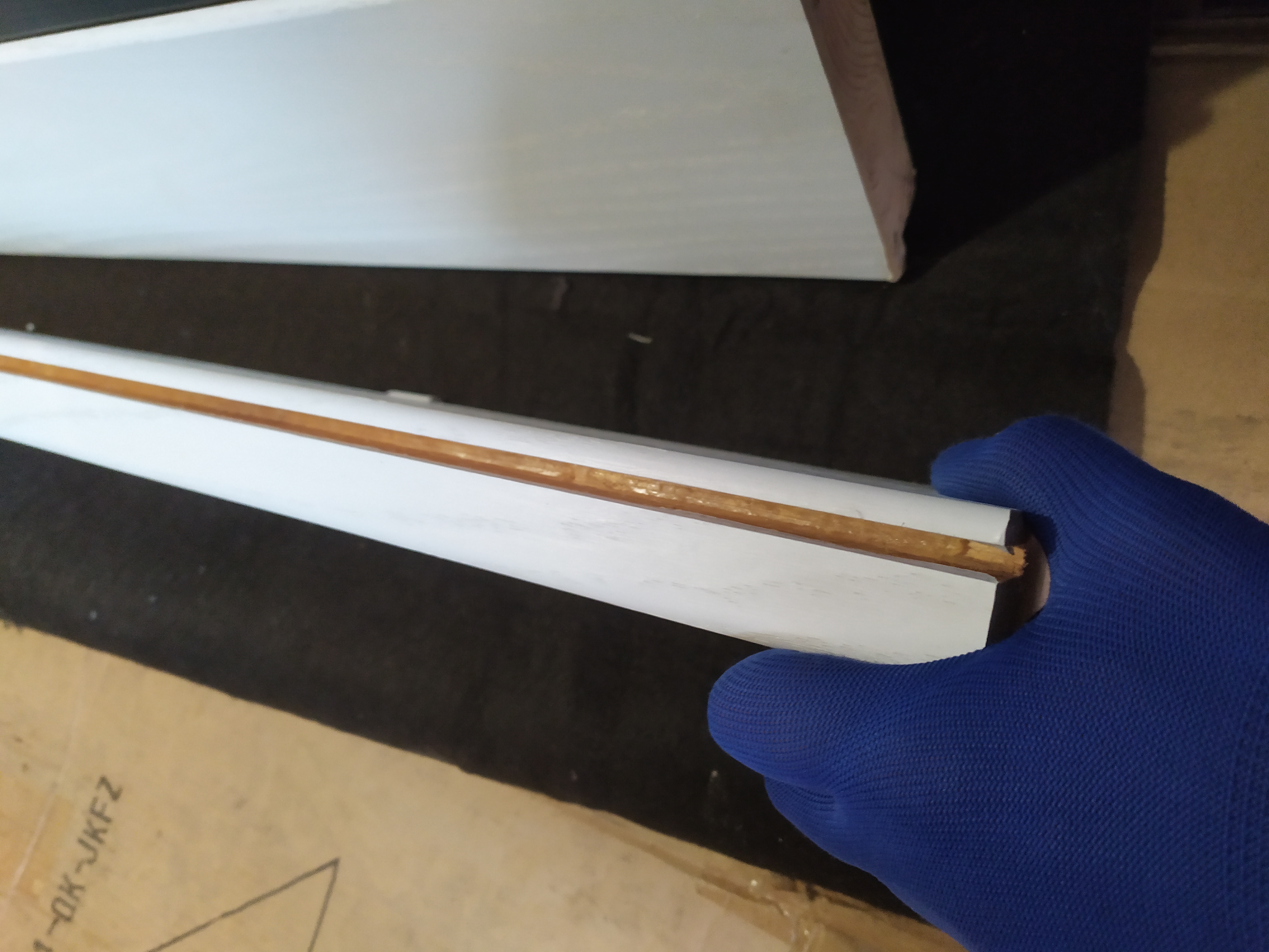 Фото переклеювання невдало склеєних іншим виконавцем дверей