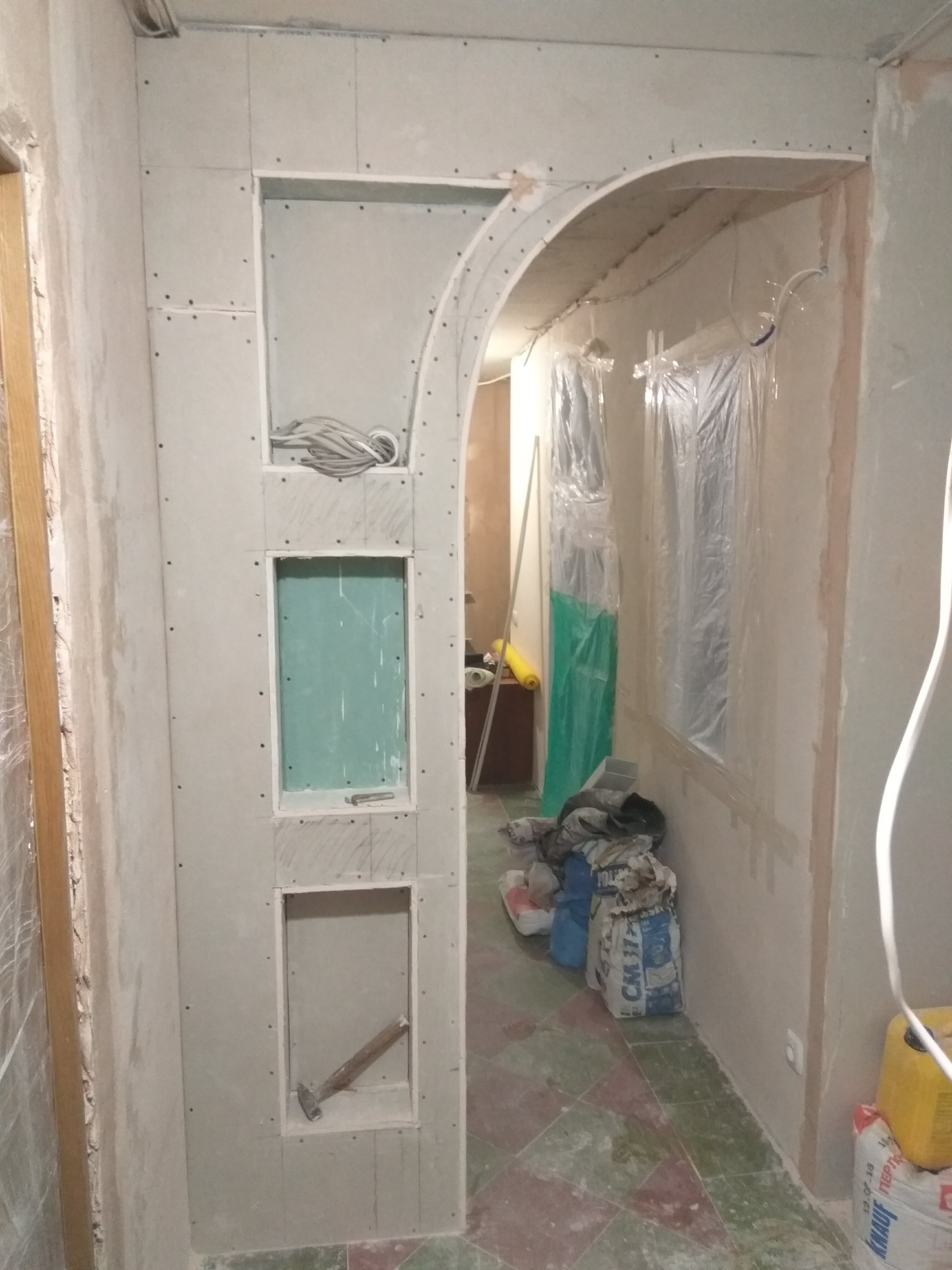 Фото Монтаж арки из гипсокартона