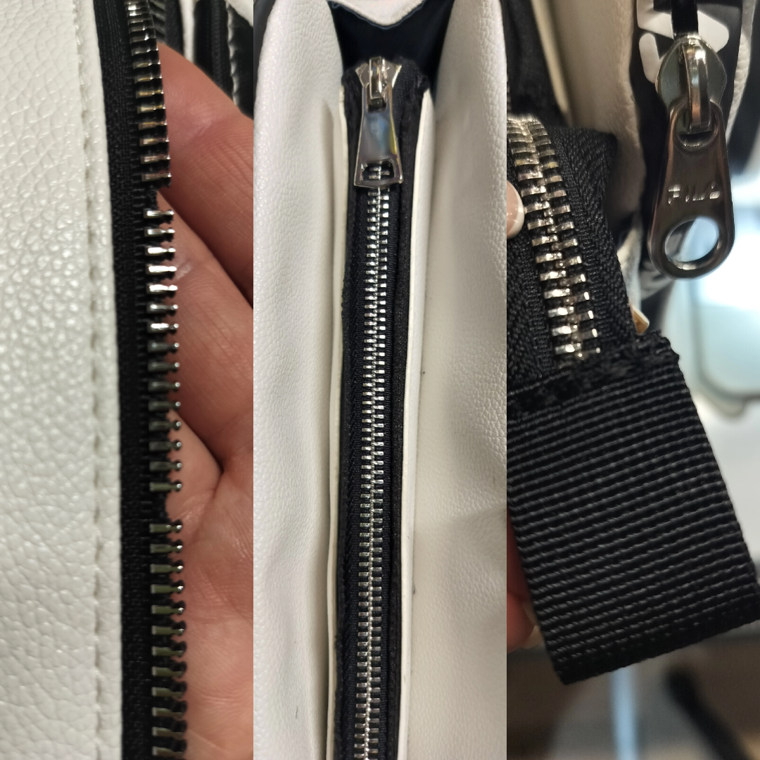 Фото Заміна блискавки в сумці з білого шкірзаму