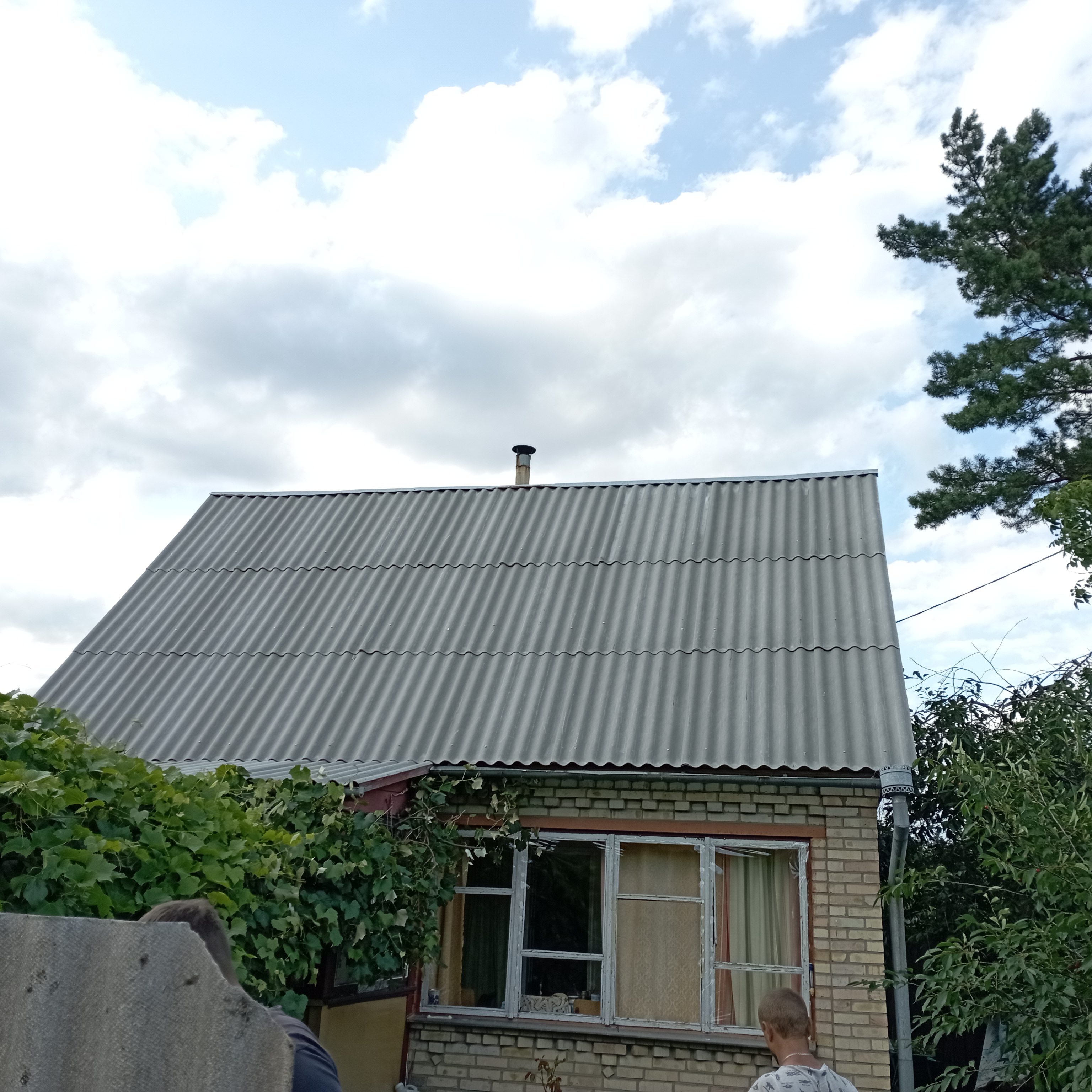 Фото заміна шиферу на даху будинку 