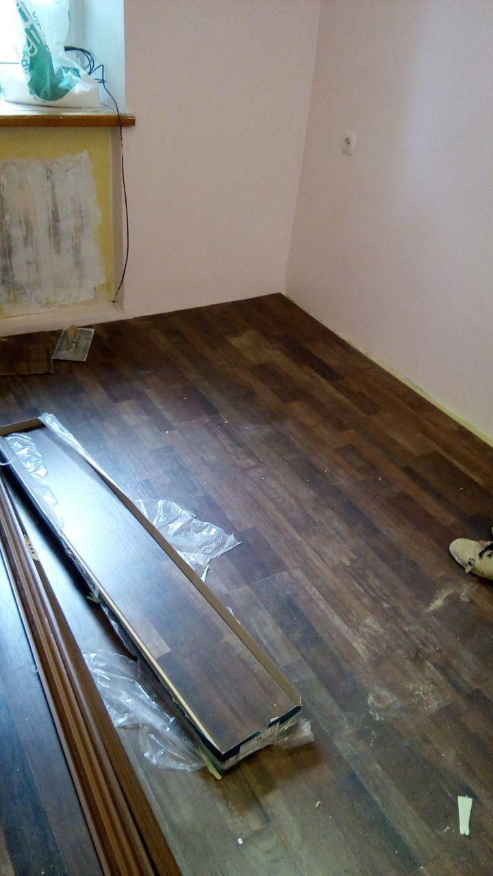 Фото Укладка ламінату.