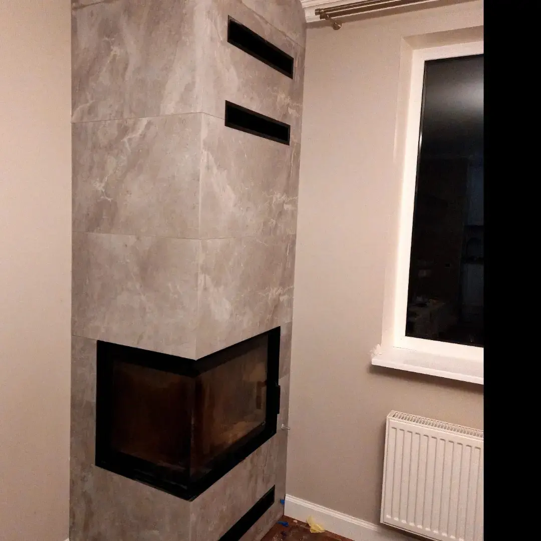 Фото Облицювання каміну плиткою