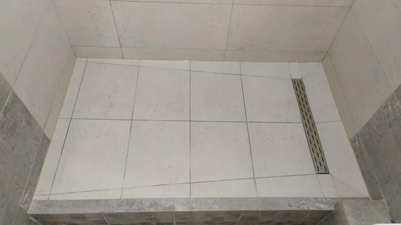 Фото душовий піддон "конвертом" з нуля під ключ
від 10000 до 15000 залежно від конфігурації